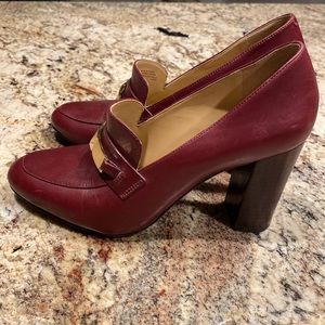 Michael Kors burgundy pumps. Think heel. Gold thick chain in front.  Size 7M
